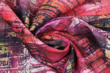 Swirled swatch Hotel Burgandy fabric (multi-tonal marbled/distressed look fabric in grey, green, pink, purple, orange, red with black distress lines and marks and subtle black text)