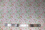 Flat swatch floral printed fabric in tose (small flowers on white)