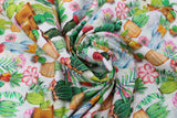 Swirled swatch of multi potted cactus printed fabric