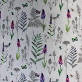 Swatch of small butterfly/floral print on white