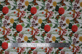 Flat swatch white floral fabric (white fabric with repeated floral and butterfly pattern, medium sized pink, yellow and purple flowers with large green stems and orange, yellow butterflies)