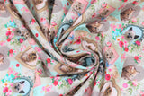 Swirled swatch framed kitties fabric (beige and light blue marbled fabric with pink and blue floral with greenery around various style frames with kitten photos inside)