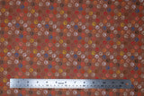 Flat swatch paw prints fabric (brown fabric with tossed small paw prints in white, grey, brown, blue, orange, pink, red, yellow)