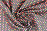 Swirled swatch lips printed fabric (black fabric with tiny lines of blue and green hearts and red lips)