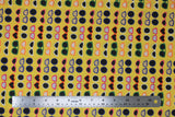 Flat swatch sunglasses fabric (bright yellow fabric with lines of sunglasses in various shapes/styles in orange, pink, green, blue, white with light and dark lenses)