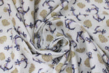 Swirled swatch anchors fabric (white fabric with small tossed grey/steel look anchors with rope allover and small tossed beige coral plants)