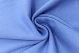 Swirled swatch of ribbing material in royal