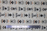 Flat swatch Wanted Dead or Alive fabric (cream fabric with vintage style "Wanted" posters with cowboy skeletons, guns, rewards, etc.)