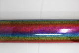 Roll of iridescent rainbow coloured PVC with grid pattern