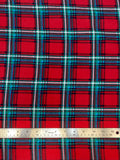 Flat swatch winter themed flannel in Christmas flannel (red/green/blue/white plaid squares)