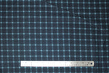 Flat swatch American themed printed fabric in Blue & Navy Plaid