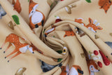 Swirled swatch forest friends fabric (tan fabric with tossed cartoon forest creatures in full colour: racoon, fox, squirrel, deer, owl, tossed green leaves, brown and red mushrooms, brown and green acorns)