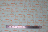 Flat swatch monkey see monkey do fabric (pale blue fabric with cartoon monkeys in light brown/grey with stripes look hanging from tree branches)
