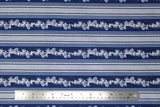 Flat swatch winter printed fabric in Pinecone Stripes on Navy