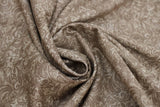 Swirled swatch paisley printed fabric in brown