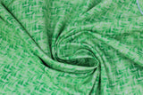 Swirled swatch garden themed printed fabric in Green Leaves on Light Green