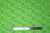 Flat swatch garden themed printed fabric in Green Leaves on Light Green