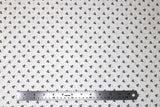 Flat swatch Blueberry Buckle (and floral) themed fabric in Grey Leaves on White