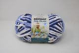 Ball of Bernat Baby Blanket in shade Blue Dreams (indigo, baby blue, white)