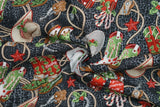 Print "Boots & Hats" from the Howdy Christmas collection, twisted to show drape and texture.