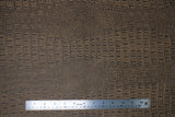 Flat swatch gator textured vinyl in buckskin (medium cool brown)