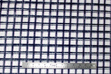 Flat swatch calico fabric in navy, purple, white plaid