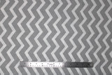 Flat swatch calico fabric in grey and white zigzag (chevron)