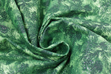 Swirled swatch Pinecones fabric (green fabric with busy dark green pinecones and sprigs allover busy collage style with sparkly silver metallic effect)