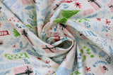 Swirled swatch Sparkle Stockings fabric (white fabric with busy tossed christmas emblems allover in messy drawn style: stockings, gifts, trees, etc. in blue, pink and green colours with gold and silver metallic effect sparkles allover)
