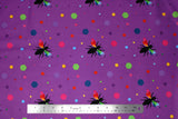 Flat swatch colourful print in purple (bees and multi-coloured hexagons)