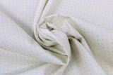 Swirled swatch assorted swiss & dots printed fabric in Cream Dots on Off White