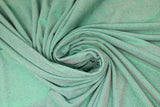 Swirled swatch aqua crystal fabric (blue green fabric with sparkle effect)