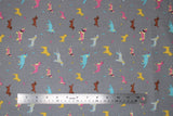Flat swatch assorted grey fabric (grey fabric with tossed small assorted cartoon dogs and tiny bones in yellow, blue, pink colourway with brown weiner dogs)