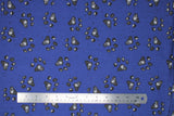 Flat swatch paws fabric (dark blue fabric with large tossed black dog paws with white reflections)