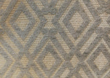 A lattice texture of diamonds with light grey velvet diamonds on a cream base