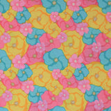 Square swatch multi colour flowers fabric (brightly coloured floral heads in yellow, pink, and baby blue collaged allover in various sizes)