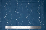 Flat swatch fairy printed fabric in White & Silver Fairy Lights on Blue