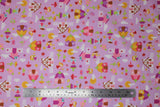 Flat swatch fairy garden fabric (pale light purple fabric with brightly coloured tossed cartoon fairy related emblems including fairies, houses with picket fences, tossed floral and clouds, etc.)