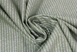 Swirled swatch farmhouse themed printed fabric in White Cursive on Green