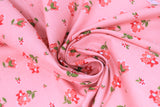 Swirled swatch summer blush fabric (pink/coral fabric with tossed red and white small floral with green stems)