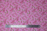Flat swatch tulips and lilies pink fabric (light pink fabric with medium sized tossed pink tulips and lilies with green stems)