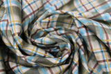 Swirled swatch wild and free printed fabric in plaid