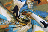 Swirled swatch wild and free printed fabric in Birds, Bears Cabins, Plaid