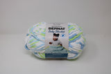 Ball of Bernat Baby Blanket in shade Funny Prints (white, blue, green)