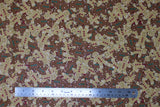 Flat swatch Stacked fabric (busy collaged light and dark beige/brown gingerbread cookie printed fabric allover cartoon style with smiling faces and red and green buttons)