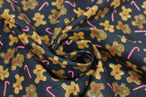 Swirled swatch Tossed fabric (black fabric with tossed small brown gingerbread cookies and tossed red and white candy canes)