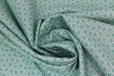 Swirled swatch vintage print fabric in White Squares & Green Flowers on Mint