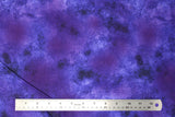 Flat swatch marbled solid fabric in purple