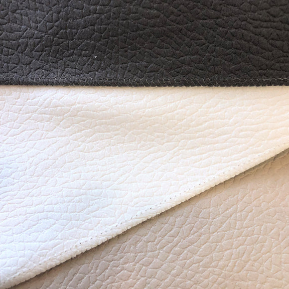 Group swatch faux leather look upholstery fabric in various colour options