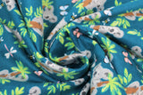 Swirled swatch koalas fabric (deep teal fabric with tossed grey koalas with brown tree branches with green leaves and tossed bees, butterflies and dragonflies)